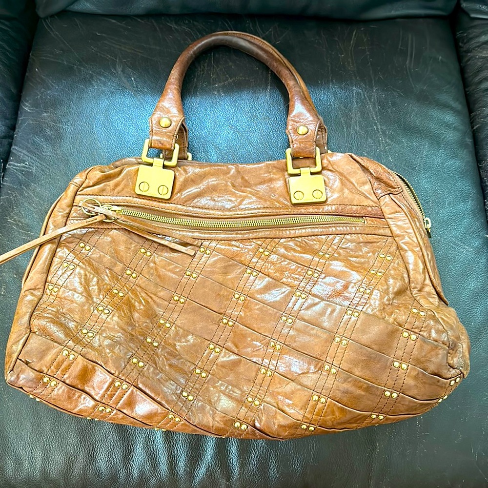 Brown vegan leather with gold speckles here and there